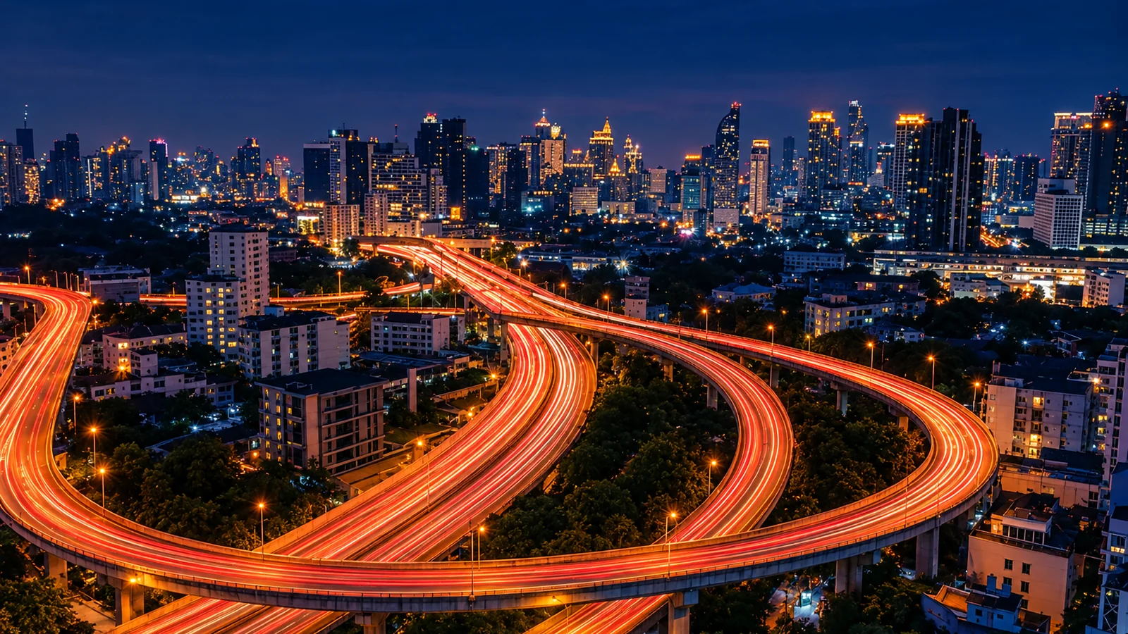 Stationary traffic on a Bangkok expressway at dusk with light trails across the lanes